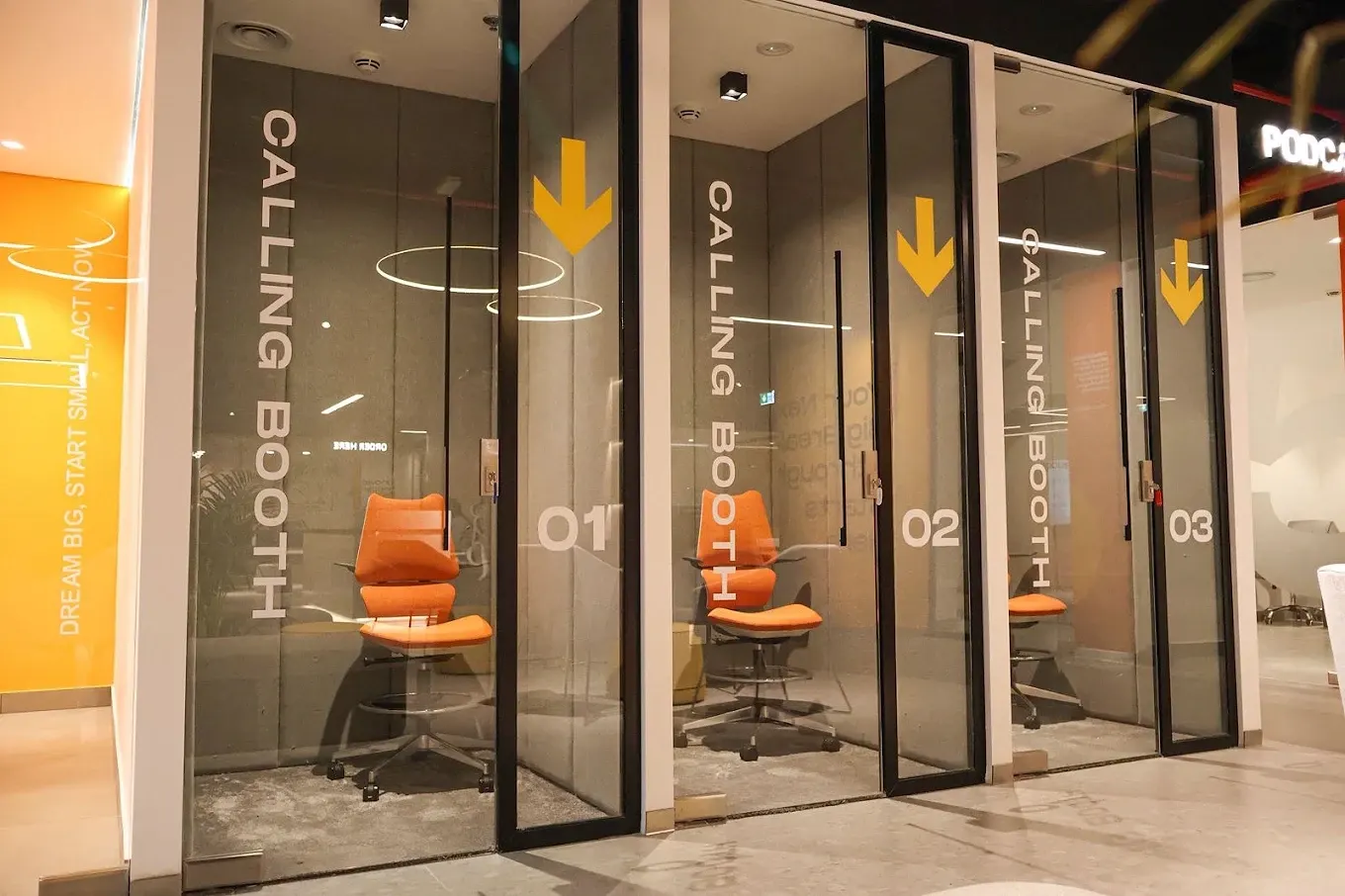 Three soundproof calling booths numbered 01 to 03